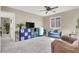 Spacious bonus room with carpet and ceiling fan, ready for your personal touch at 5614 Bishop Flowers St, Las Vegas, NV 89130
