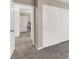 Hallway featuring carpet and closet with large sliding doors at 5614 Bishop Flowers St, Las Vegas, NV 89130