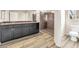 The bathroom boasts double sinks, granite countertops, and a glass-enclosed shower at 5671 Camilla Cellars Ct, Las Vegas, NV 89141