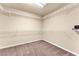 This closet features carpet, shelving, and plenty of storage space at 5671 Camilla Cellars Ct, Las Vegas, NV 89141