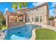 Backyard featuring a private pool and outdoor kitchen area at 5671 Camilla Cellars Ct, Las Vegas, NV 89141
