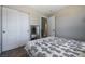 Bedroom featuring a closet and mirror, with ample natural light for a serene atmosphere at 6745 Jackson Junction St, Las Vegas, NV 89149