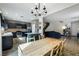 Open kitchen and dining area with stylish countertops, appliances, and access to the backyard at 6745 Jackson Junction St, Las Vegas, NV 89149