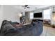 Comfortable living room featuring neutral walls, tile floors, and lots of natural light at 6745 Jackson Junction St, Las Vegas, NV 89149
