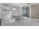 Serene bathroom features a freestanding tub and separate glass-enclosed shower at 6909 Forest Gate St, North Las Vegas, NV 89084