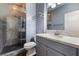 Stylish bathroom with a glass-enclosed shower and modern vanity at 6909 Forest Gate St, North Las Vegas, NV 89084