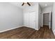 Neutral bedroom with hardwood floors and closet at 6909 Forest Gate St, North Las Vegas, NV 89084