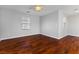 Bright bedroom with hardwood flooring and ceiling fan at 6909 Forest Gate St, North Las Vegas, NV 89084