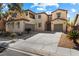 Charming two-story home with a three car garage and well-manicured front yard at 6909 Forest Gate St, North Las Vegas, NV 89084