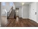 Bright foyer with staircase, hardwood floors, and natural light at 6909 Forest Gate St, North Las Vegas, NV 89084