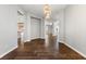 Spacious living room with hardwood flooring and modern lighting at 6909 Forest Gate St, North Las Vegas, NV 89084