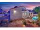 Beautiful exterior view showcasing the backyard and swimming pool with a tiled patio at 7405 Blue Sage Ct, Las Vegas, NV 89129