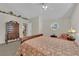 Comfortable main bedroom with a wooden dresser and a queen size bed at 7405 Blue Sage Ct, Las Vegas, NV 89129