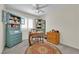 Bright office space with colorful furniture and a large rug at 7405 Blue Sage Ct, Las Vegas, NV 89129