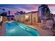Inviting backyard pool and covered patio offer a relaxing outdoor living space at 7405 Blue Sage Ct, Las Vegas, NV 89129