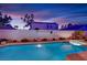 Private backyard oasis featuring a swimming pool, spa, and block wall for seclusion at 7405 Blue Sage Ct, Las Vegas, NV 89129
