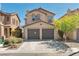 Charming two-story home featuring a two-car garage and desert landscaping at 7826 Shingle Beach St, Las Vegas, NV 89166