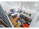 Aerial view of an open floor plan living space connects the kitchen to the living room with high ceilings at 792 Valley Rise Dr, Henderson, NV 89052