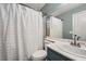 This full bathroom has a single sink and vanity, toilet and shower-tub combination at 8228 Fritzen Ave, Las Vegas, NV 89131