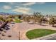 A lovely community park, showcasing walking paths, desert landscaping, and open green space at 8228 Fritzen Ave, Las Vegas, NV 89131