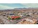 An aerial community view featuring a red BBQ restaurant and commercial businesses at 8228 Fritzen Ave, Las Vegas, NV 89131