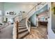Grand entryway with a staircase and high ceilings, creating an inviting and spacious first impression for guests at 8228 Fritzen Ave, Las Vegas, NV 89131