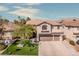 Beautiful two-story home with a three-car garage, manicured lawn, and desert landscaping in a desirable neighborhood at 8228 Fritzen Ave, Las Vegas, NV 89131