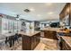 This kitchen features a spacious island and breakfast nook, perfect for both meal preparation and casual dining at 8228 Fritzen Ave, Las Vegas, NV 89131