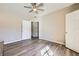 Bedroom boasts natural light, wood-style flooring, and easy access to en-suite and closet at 830 Carnegie St # 724, Henderson, NV 89052