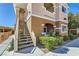 Stairway leading to an upper level residence with fresh landscaping at 830 Carnegie St # 724, Henderson, NV 89052