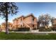 Inviting condo complex with multiple stories, stylish architecture, and lush landscaping at 830 Carnegie St # 724, Henderson, NV 89052
