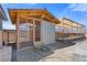 Exterior view of an aviary structure with wire mesh and a peaked roof at 9090 Josepine St, Pahrump, NV 89048