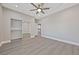 This bedroom offers a spacious closet and a modern ceiling fan at 9090 Josepine St, Pahrump, NV 89048