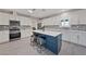 Well-appointed kitchen with a center island, stainless steel appliances, and ample cabinet space at 9090 Josepine St, Pahrump, NV 89048