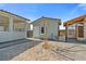 Yard featuring multiple outbuildings with pavers and gravel at 9090 Josepine St, Pahrump, NV 89048