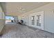 Long covered patio with brick pavers and ceiling fans for comfortable outdoor living at 9090 Josepine St, Pahrump, NV 89048