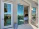 Beautiful balcony features an angel statue with a view and bedroom access through sliding glass doors at 9101 Alta Dr # 18, Las Vegas, NV 89145