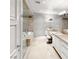 Bright bathroom with double sinks, soaking tub, and walk-in shower at 9101 Alta Dr # 18, Las Vegas, NV 89145