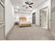 Cozy bedroom with soft carpet, overhead fan, and neutral tones, creating a calming and restful atmosphere at 9101 Alta Dr # 18, Las Vegas, NV 89145