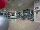 Well-equipped gym featuring cardio machines, free weights, and mirrored walls, great for a complete workout at 9101 Alta Dr # 18, Las Vegas, NV 89145