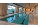 Stunning indoor pool with large windows offering scenic views and comfortable seating, perfect for relaxation and exercise at 9101 Alta Dr # 18, Las Vegas, NV 89145