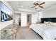 This bedroom has a ceiling fan, a tv, recessed lights, and plush carpet at 9101 Alta Dr # 18, Las Vegas, NV 89145