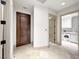 Mud Room with an exterior door near the Laundry Room, providing convenience and functionality for everyday living at 9101 Alta Dr # 18, Las Vegas, NV 89145