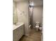 Clean bathroom with vanity, toilet, and shower-tub combo at 9343 Sully Ave, Las Vegas, NV 89149