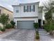 Charming two-story home with a brick driveway and a well-maintained landscaped front yard at 9343 Sully Ave, Las Vegas, NV 89149