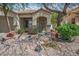Charming home with desert landscaping and a welcoming front entrance at 9446 Baltinglass St, Las Vegas, NV 89123