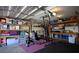 Organized garage featuring ample shelving and workout equipment at 9446 Baltinglass St, Las Vegas, NV 89123