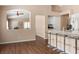 Bright kitchen showcases stainless steel appliances, granite counters, and a breakfast bar at 9446 Baltinglass St, Las Vegas, NV 89123