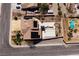 Aerial view of a home with a pool, spa, and desert landscaping at 979 Evening Dew Dr, Las Vegas, NV 89110