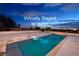 Sparkling pool surrounded by an outdoor patio, offering a relaxing escape with city views at 979 Evening Dew Dr, Las Vegas, NV 89110